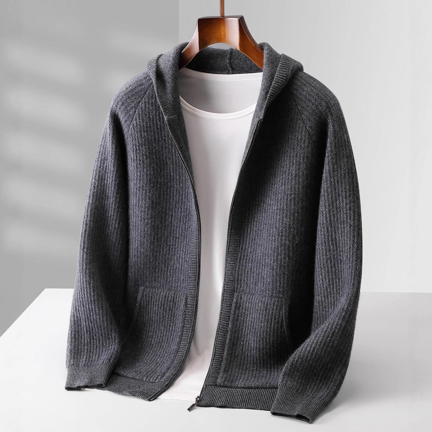 Montaracrest Elio™ cashmere hoodie, soft and luxurious, shown in a cozy fit with a front pocket and hood, in main image.