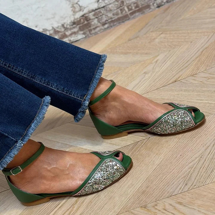 Montaracrest flat sandal with ankle strap, featuring a stylish design and comfortable fit, shown in a close-up view.