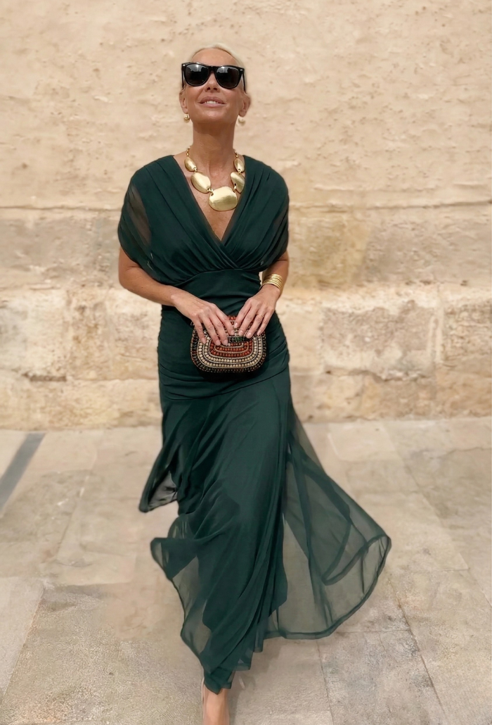 Elegant Montaracrest Luisa long dress with V-neckline, designed to enhance the silhouette, perfect for formal occasions.