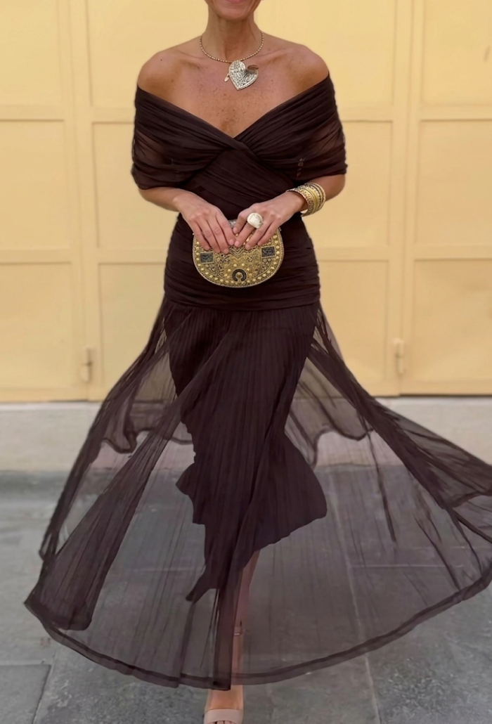 Montaracrest Luisa elegant long V-neck dress showcasing a fitted silhouette and flowing fabric for formal occasions.