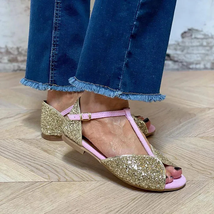 Montaracrest sandal with T-strap and stable heel, featuring a stylish design and comfortable fit.