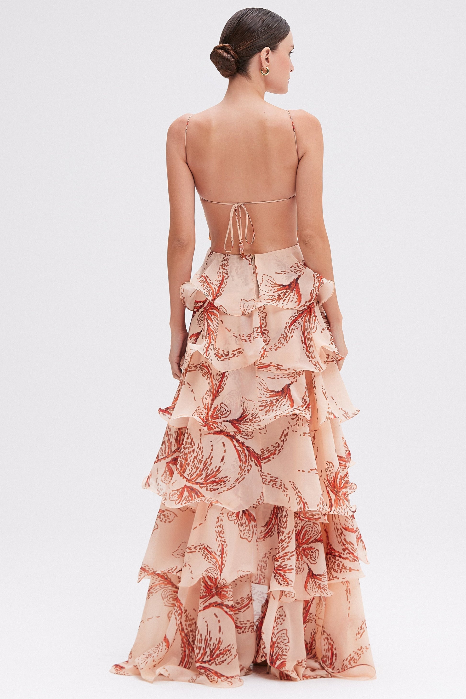 Montaracrest Amora Ruffle Gown, elegant dress with ruffled details and flowing fabric, shown in a stylish full-length view.