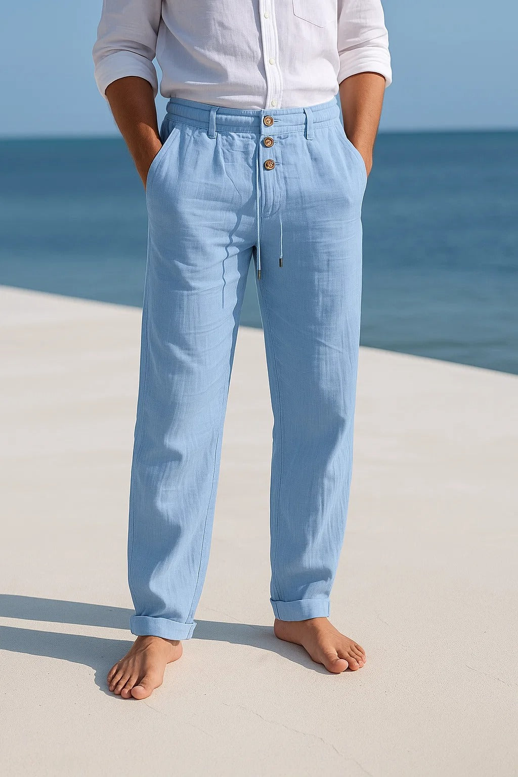 Lightweight men's linen summer pants by Montaracrest featuring a relaxed fit and neutral color, ideal for warm weather.