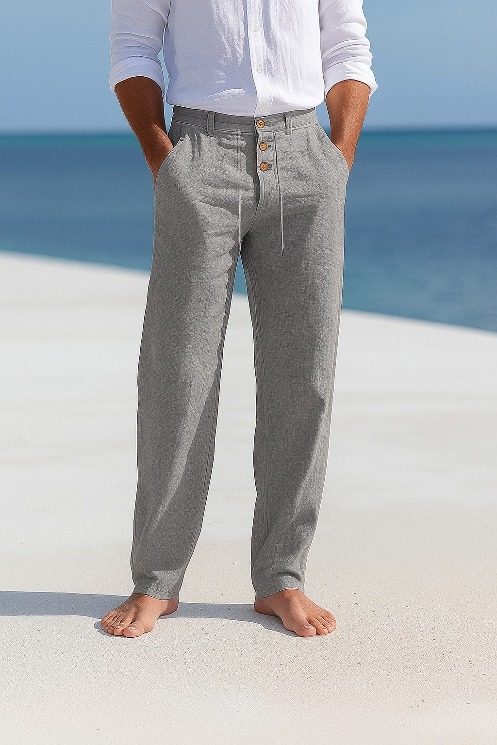 Light men's summer linen pants from Montaracrest, featuring a relaxed fit and natural fabric for comfortable warm weather wear.