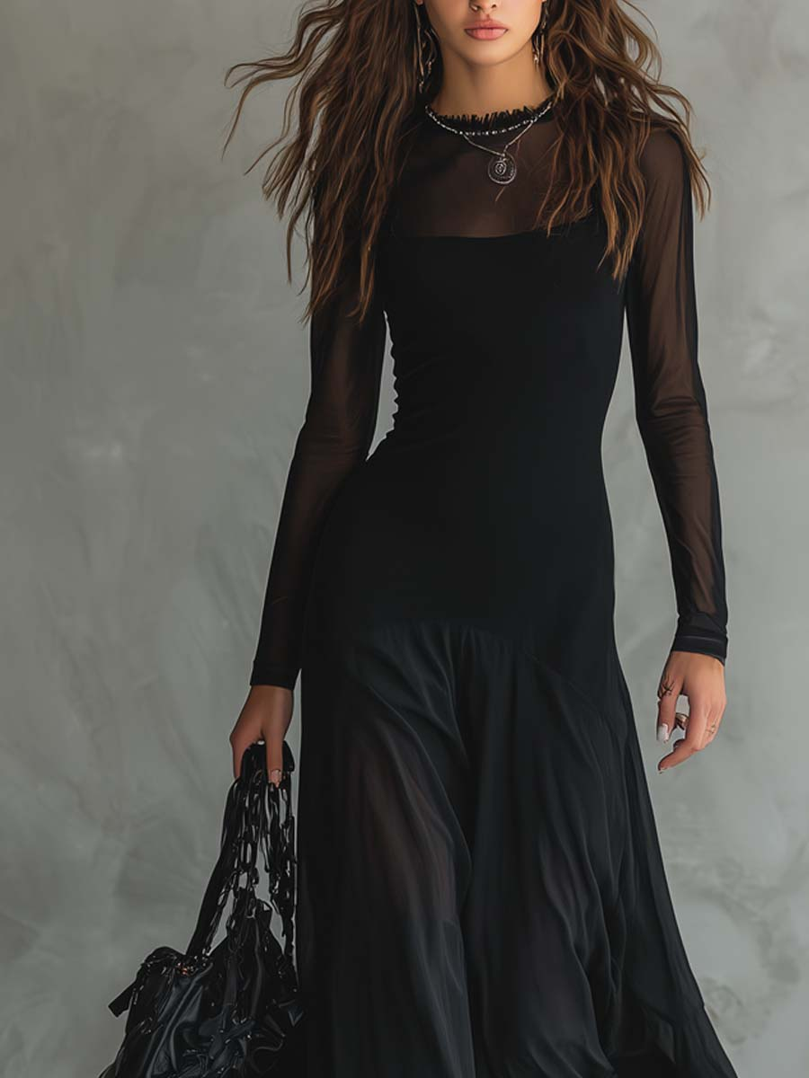 Montaracrest Neroa maxi loose-fit black tulle dress displayed on a hanger with intricate lace details.