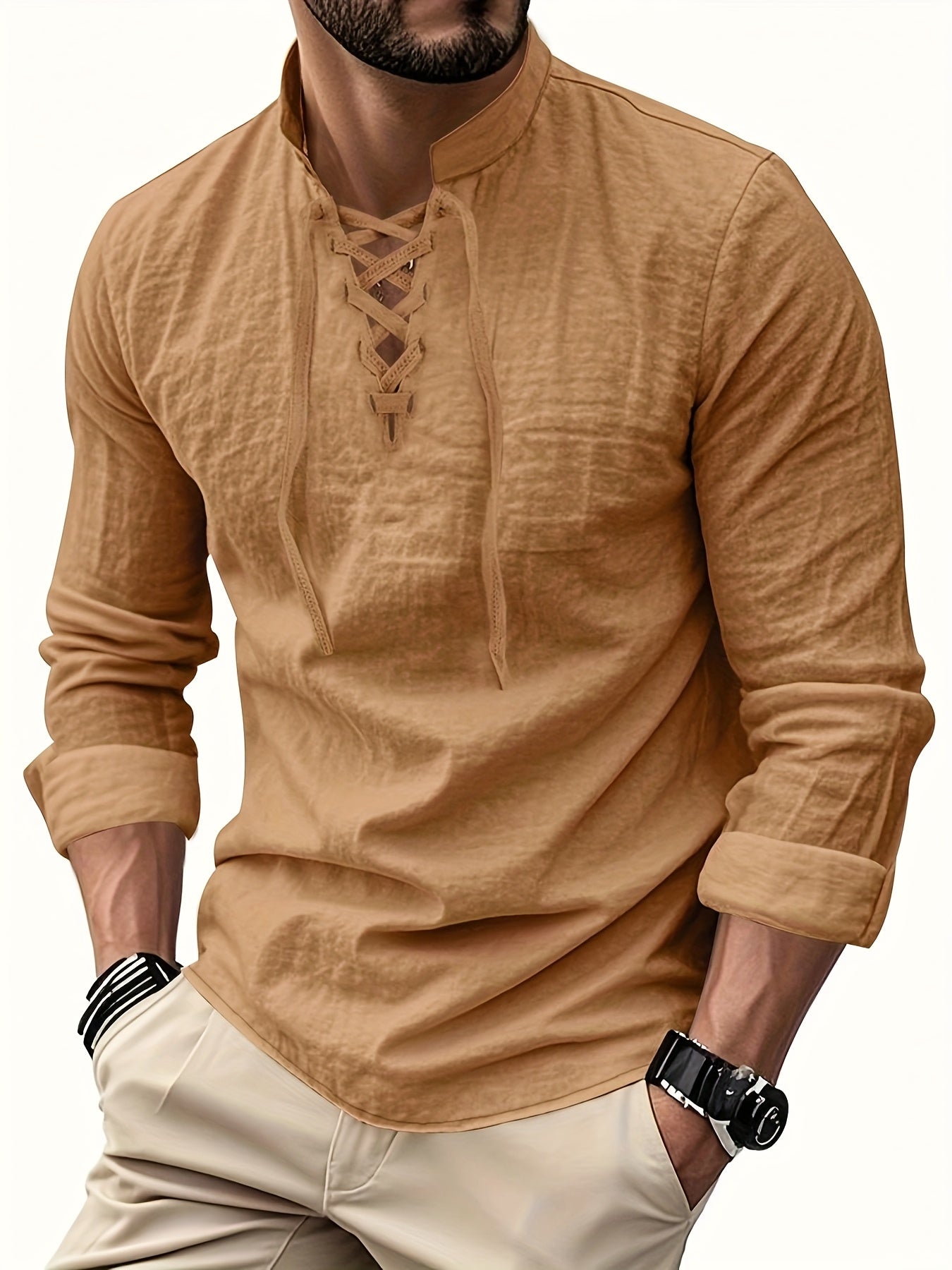 Montara & Crest V-neck shirt displayed on a hanger, featuring soft fabric and a classic fit in neutral color.