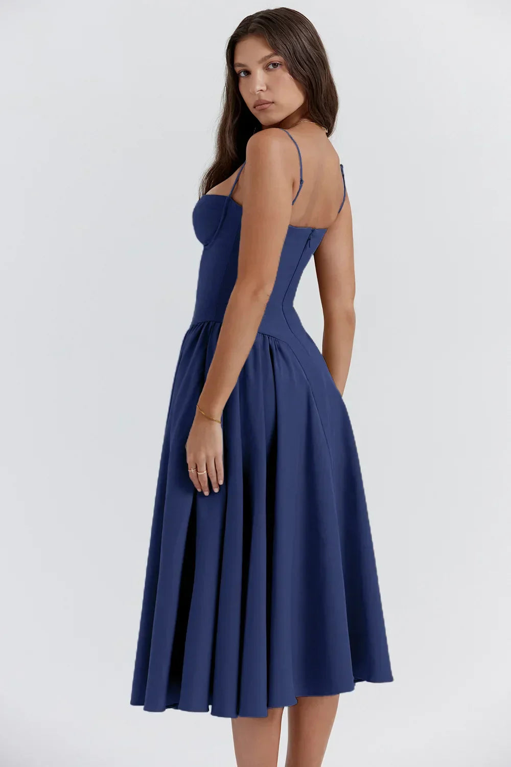Structured midi pleated dress with a fitted bodice, side pockets, by Montaracrest, shown in a stylish, elegant design.
