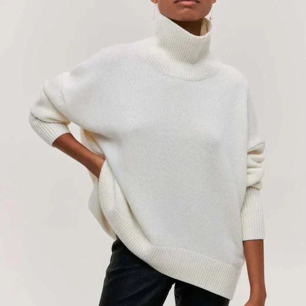 Amanda oversized dolcevita sweater by Montaracrest featuring a cozy, chunky knit design in a relaxed fit.