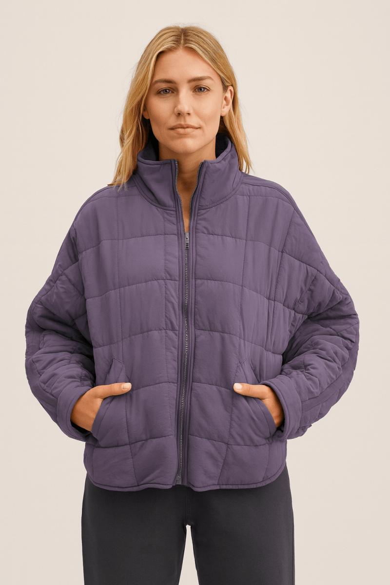 Montaracrest April lightweight puffer jacket with a zip, compact and insulated, shown in black with a high collar.