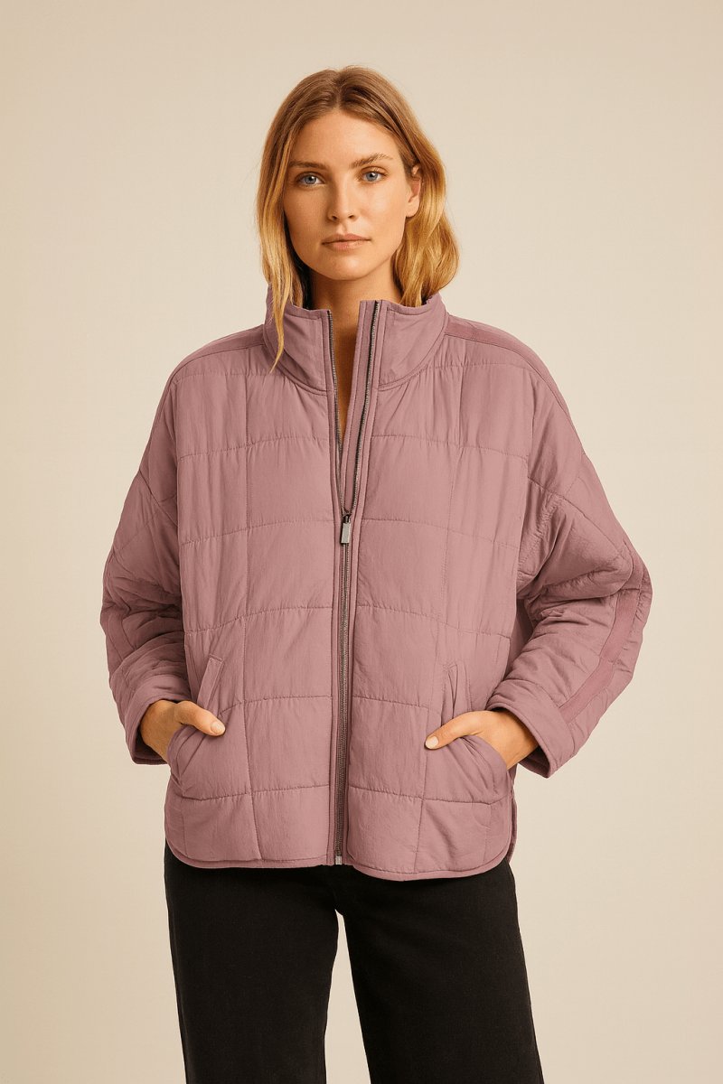 Montaracrest April lightweight, compact puffer jacket with front zip, shown in a light color, designed for warmth and portability.