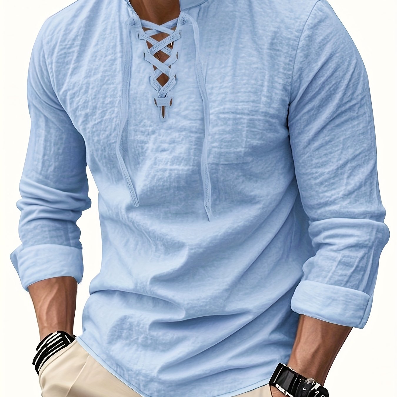 Montara & Crest V-neck shirt in soft fabric, displayed on a hanger with a close-up of the neckline and fabric texture.