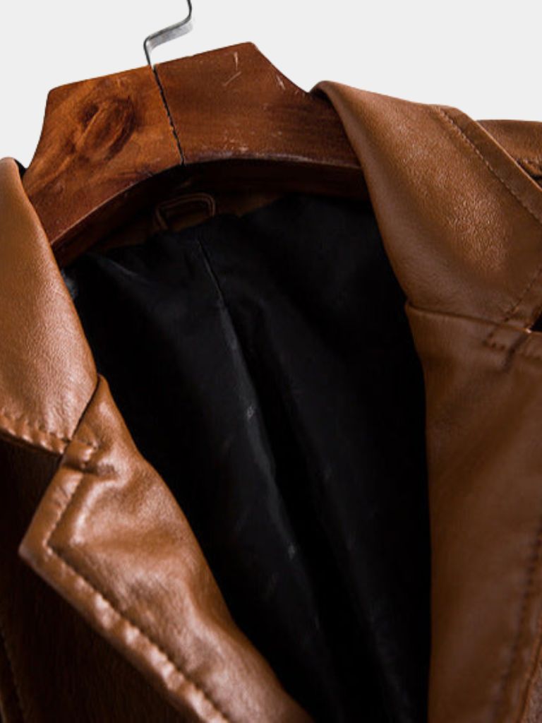 Caramel leather jacket by Montaracrest, a stylish brown leather jacket featuring a cross-crown detail and a bold, sleek design.