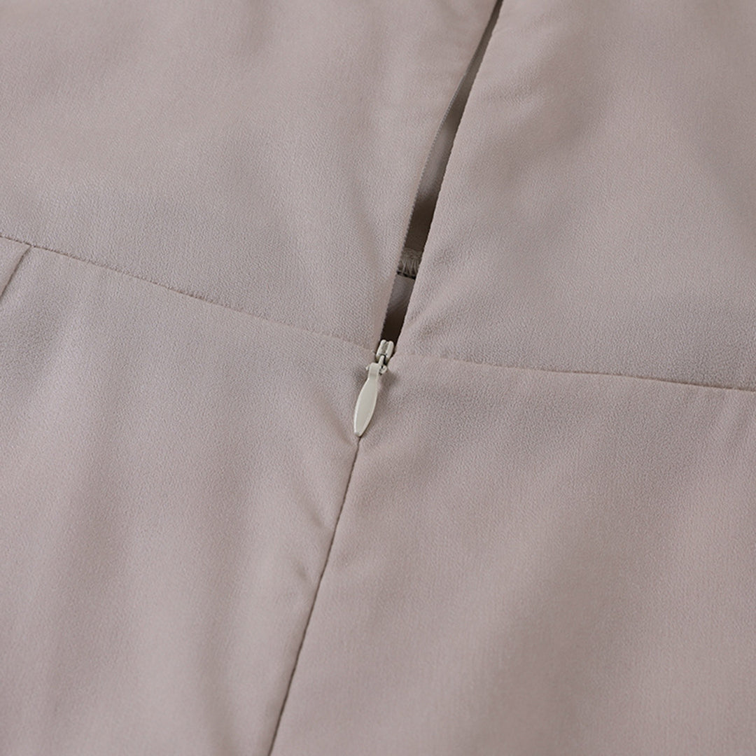 Elegant long slip dress with slit by Montaracrest, flowing fabric, and stylish design perfect for formal occasions.