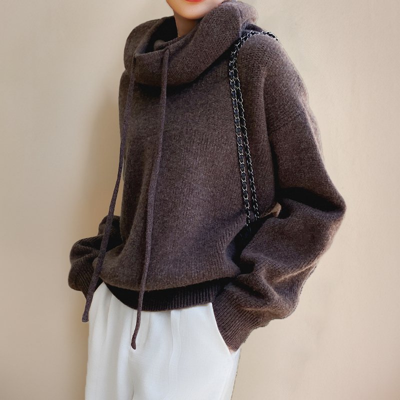 Montaracrest Napoli Cozy sweater with a roll-neck, crafted from soft merino wool, shown in a stylish close-up image.
