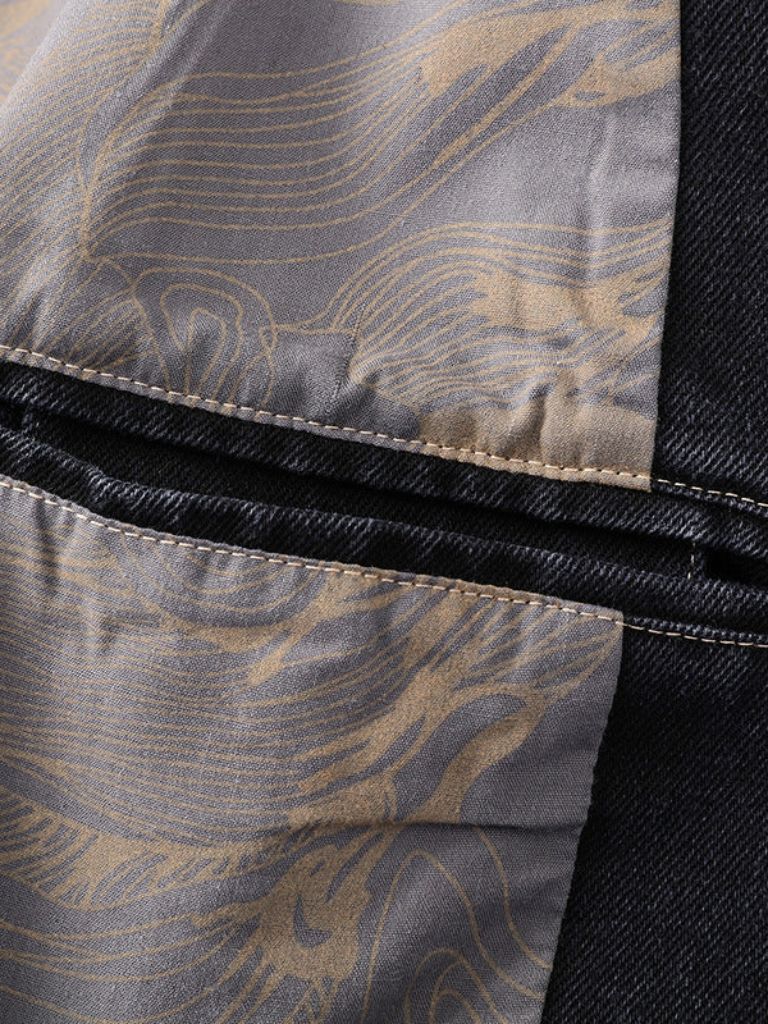 Montaracrest denim Covenant blazer jacket with a stylish cross crown design, showcasing a classic denim look and tailored fit.