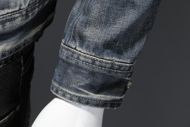 Light blue Montara & Crest denim jacket with classic collar and button closure, displayed on a hanger.
