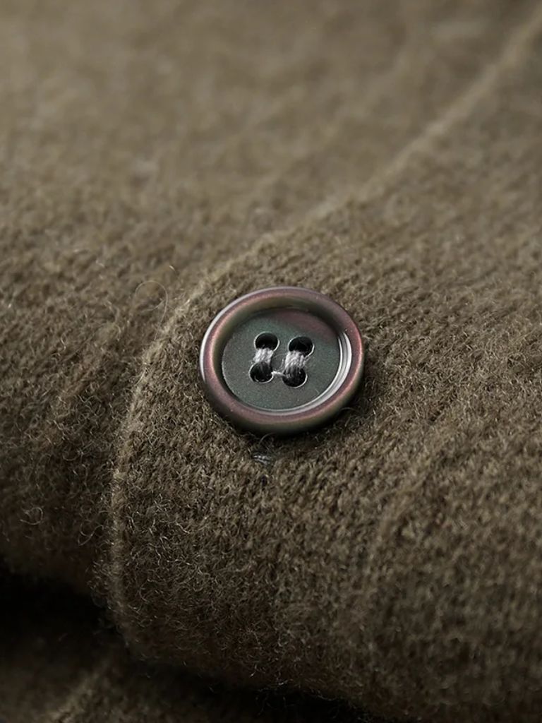 Montaracrest essential cashmere jacket with a sleek design and cross crown detail, made from soft, high-quality cashmere fabric.