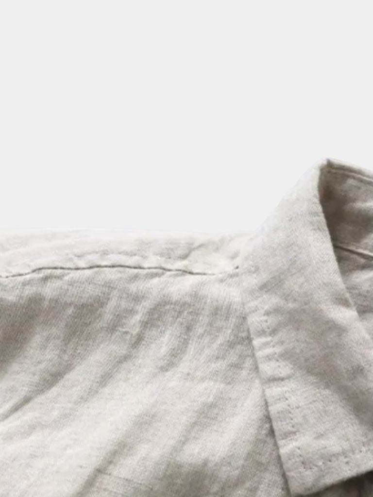 Montaracrest essential linen shirt with a cross crown design, showcasing lightweight, breathable fabric and classic style.