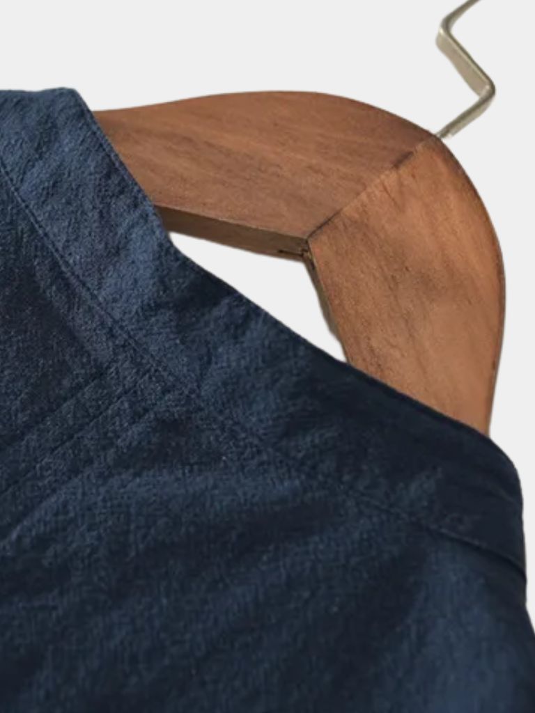 Montaracrest linen short-sleeve shirt with a cross crown design, lightweight and breathable for casual summer wear.