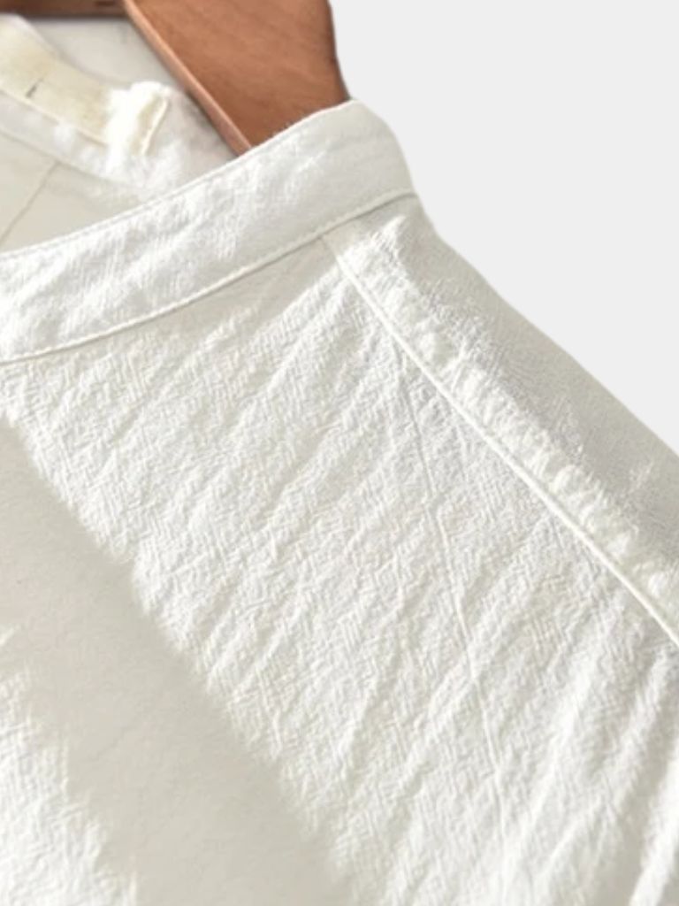 Montaracrest essential short-sleeve linen shirt with a cross crown design, lightweight and breathable for casual wear.