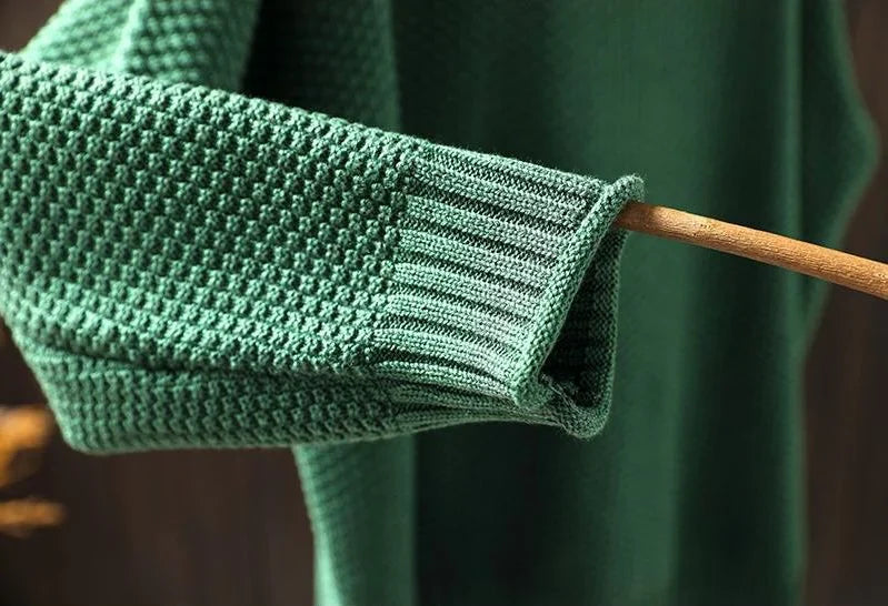 Green Veléna In Cashmere sweater by Montaracrest, featuring a soft, cozy knit fabric and stylish design.