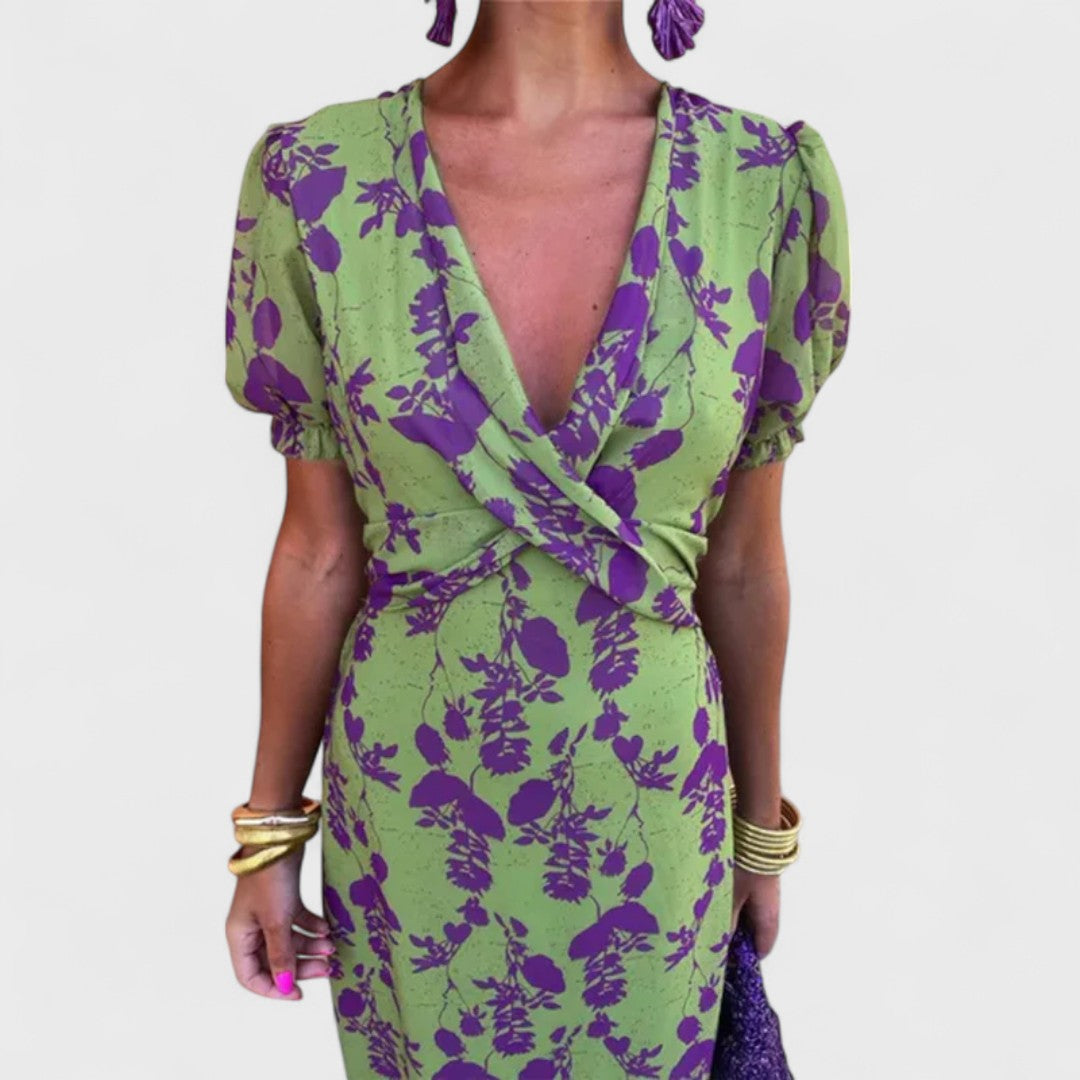 Elegant Carmen premium dress by Montaracrest featuring a deep V-neckline and stylish design, shown in a close-up front view.