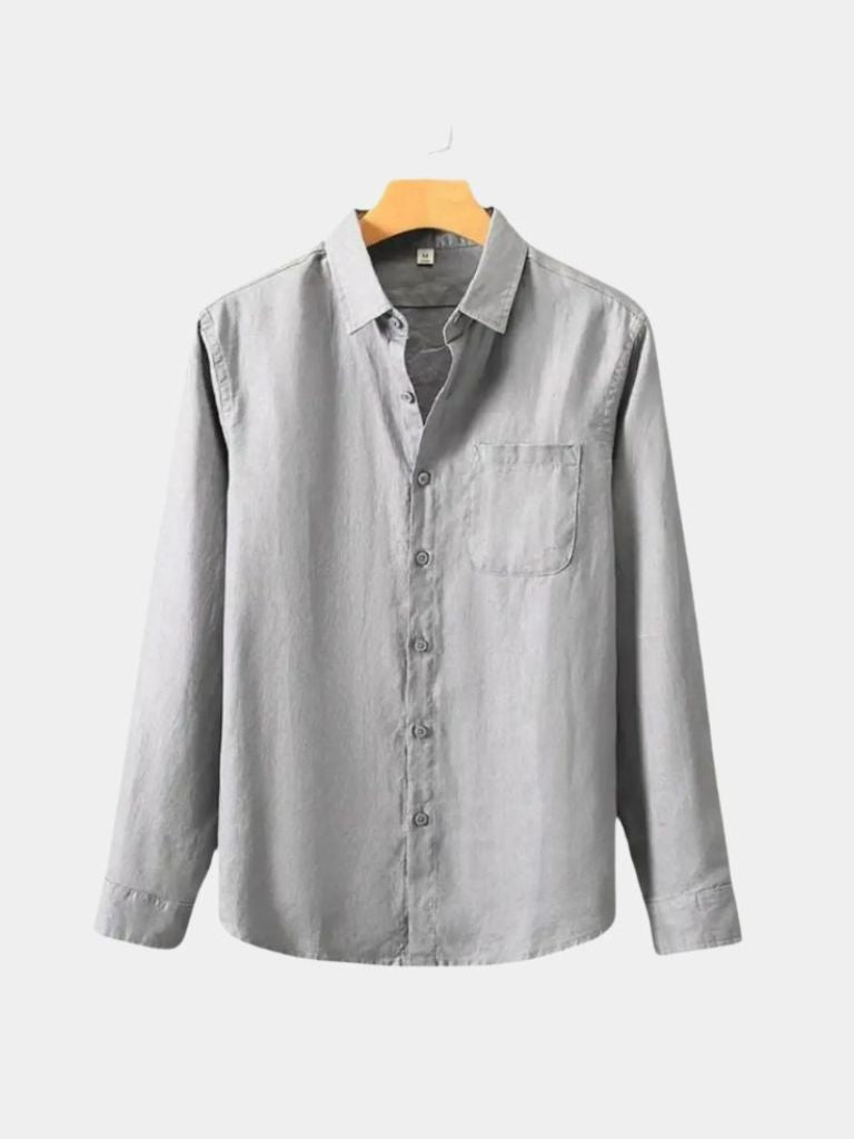 Montaracrest long-sleeve linen shirt with a simple, elegant design and a subtle crown detail on the fabric.