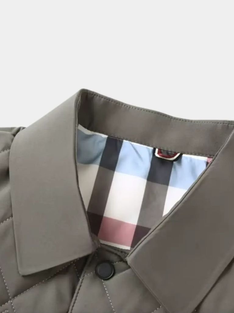 Luxury layered jacket by Montaracrest featuring sophisticated design and cross-crown details, ideal for elegant outerwear.