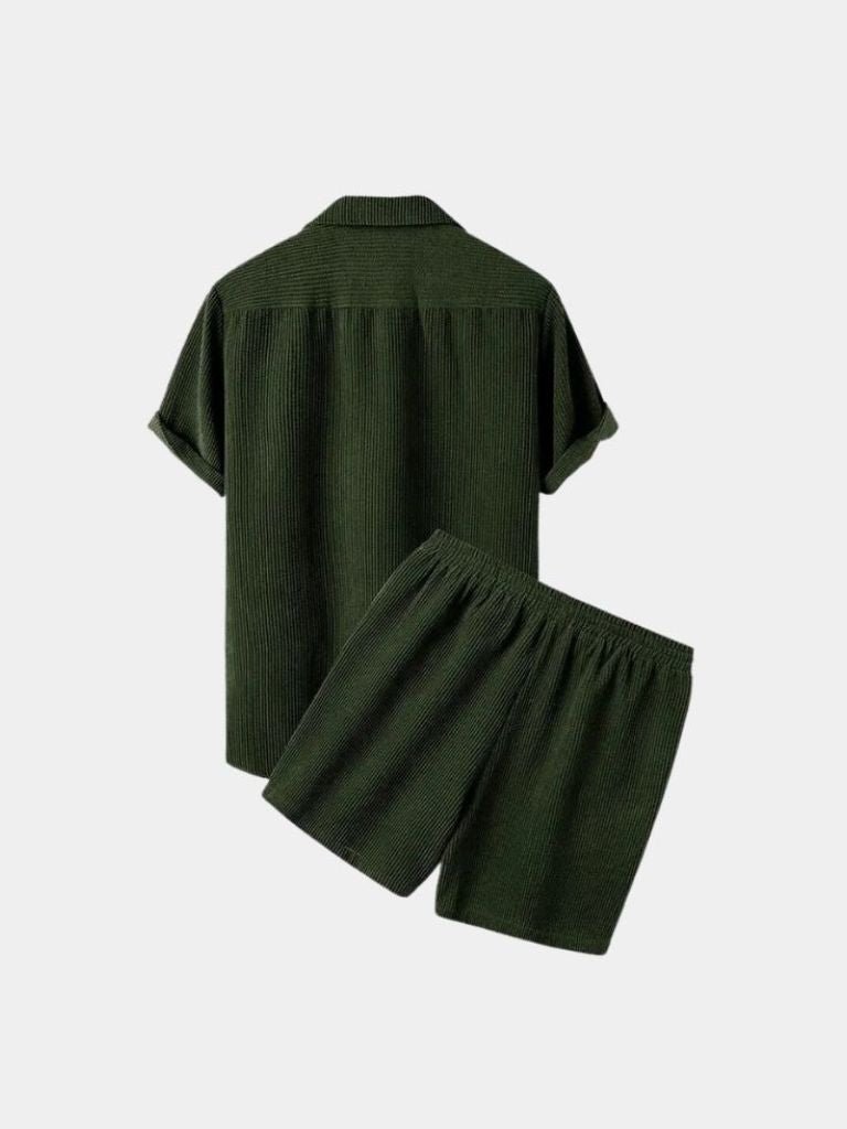 A minimalist corduroy summer set by Montaracrest featuring shorts and a matching button-down shirt, with a subtle crown detail.