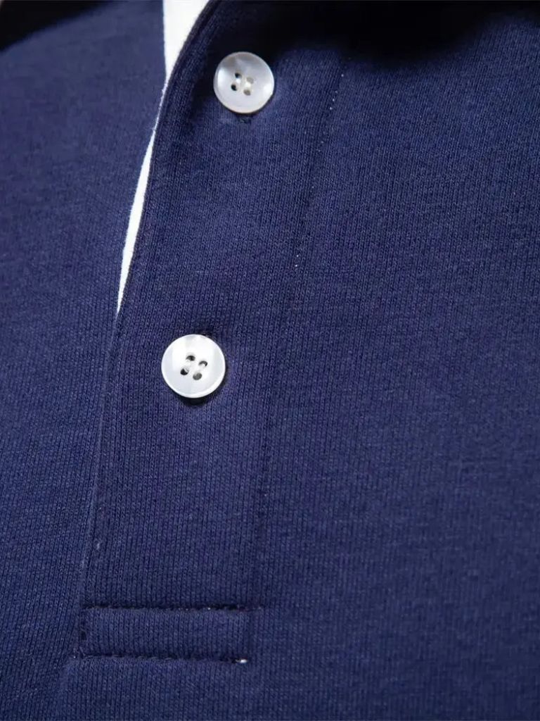 Montaracrest Polo Essenziale in classic style, featuring a subtle cross crown logo on the chest, in a timeless polo shirt design.