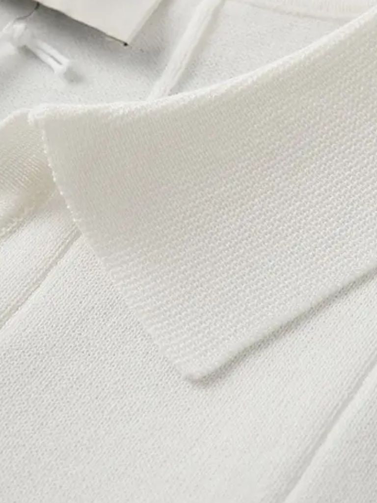 Montaracrest Portofino polo shirt featuring a cross crown logo, in classic polo style with a comfortable collar and short sleeves.