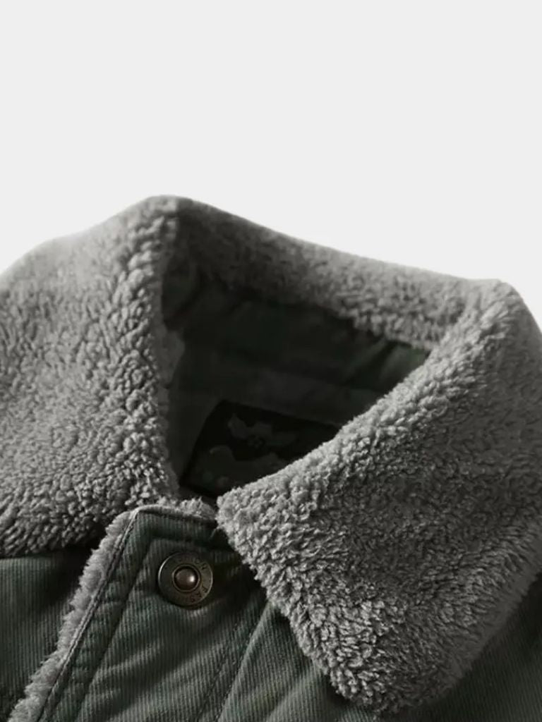 Vintage military aviator jacket by Montaracrest featuring classic design, cross crown emblem, and rugged outdoor style.